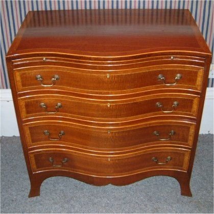 mahogany serpentine chest of drawers