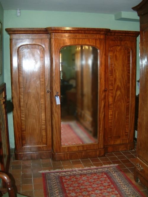 victorian mahogany mirrored triple wardrobe with linen slides drawers