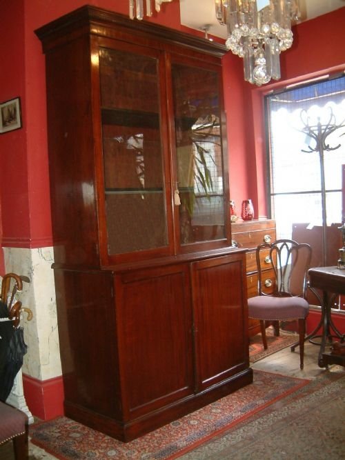 victorian mahogany glazed bookcase with cupboards below