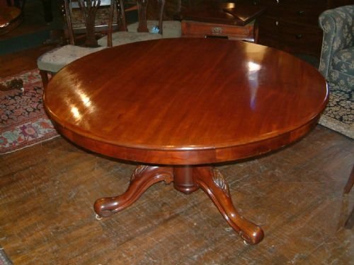 victorian mahogany pedestal dining table supported on carved pedestal base