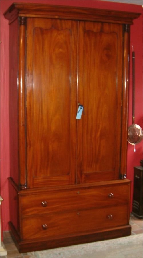 victorian mahogany wardrobe of architectural design with two drawers below