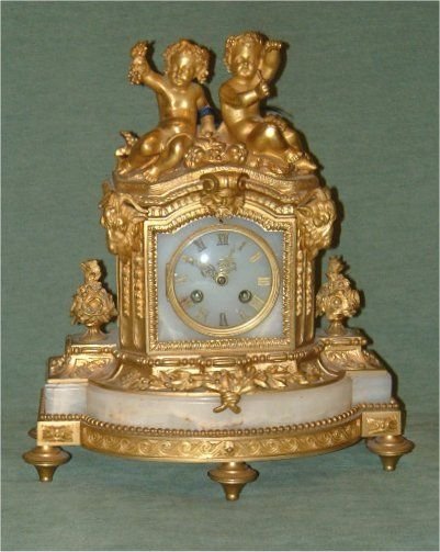 19th century ormolu alabaster mantle clock striking with bell