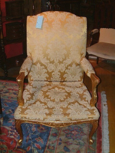 a set of four 20th century george 2nd style giltwood arm chairs