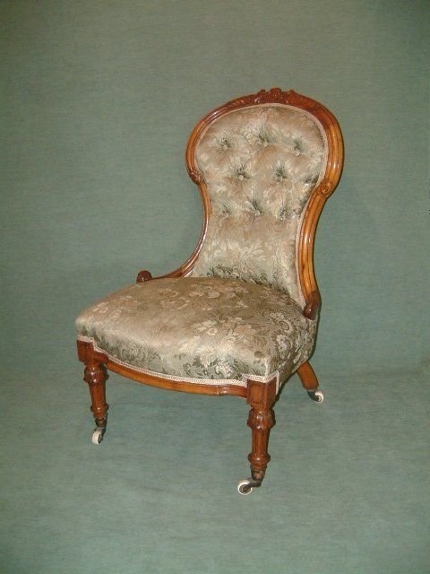 victorian finely carved walnut nursing chair