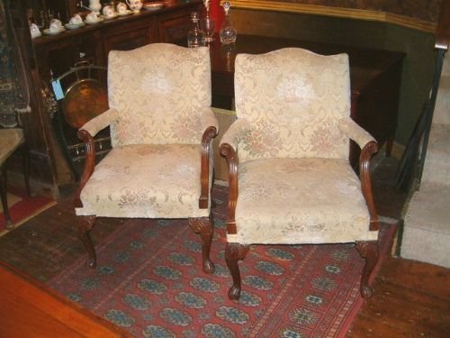 pair of 1920's gainsborough arm chairs with nicely carved decoration