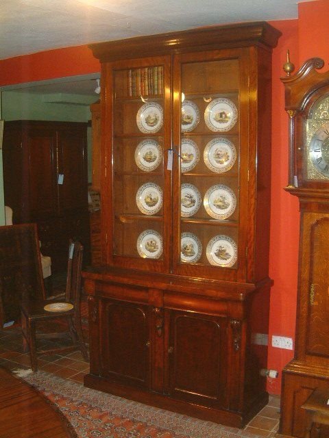 victorian mahogany glazed bookcase over two drawers cupboard below