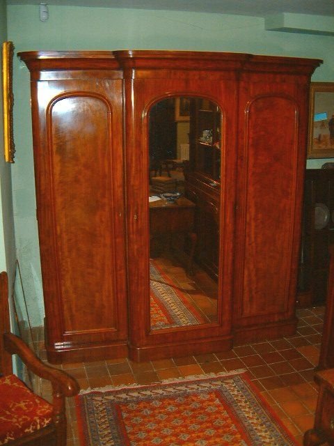 victorian mahogany triple wardrobe with mirrored centre door
