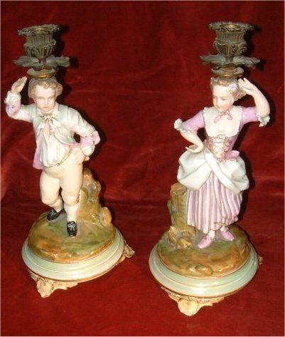 pair of 19thc french porcelain candlesticks with bronze sconces