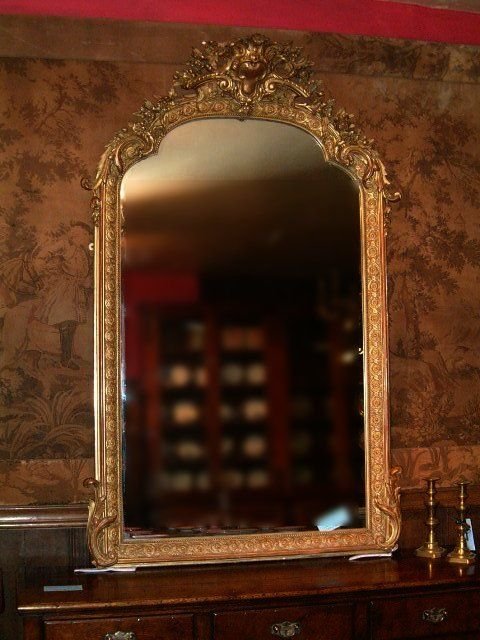 19th century large rococo style decorated gilt mirror