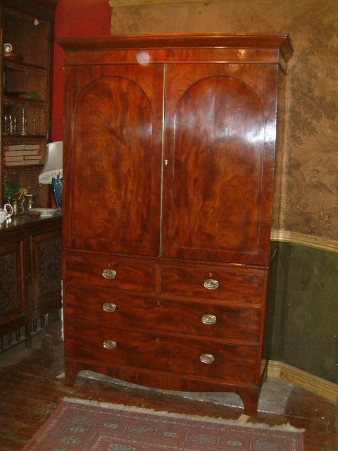 early victorian mahogany linen press now with hanging space over drawers