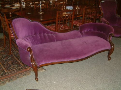 victorian mahogany upholstered chaise longue with carved detail