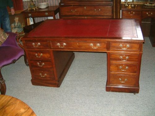 edwardian mahogany partners writing desk with red leather gold tooled top