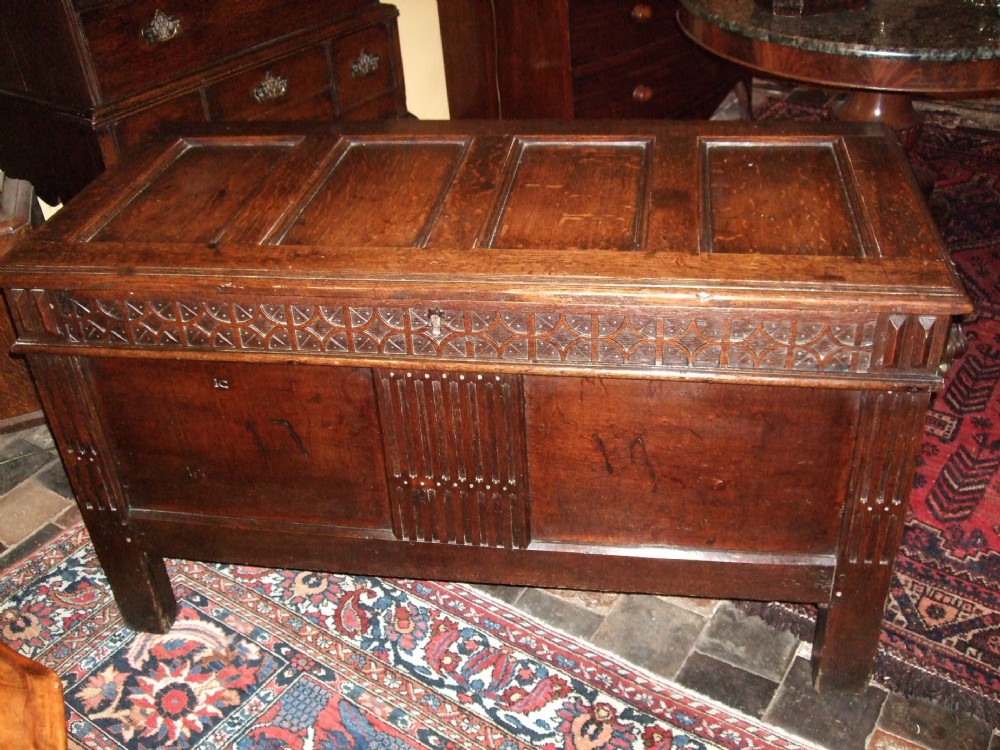 17c oak panelled coffer with carved decoration