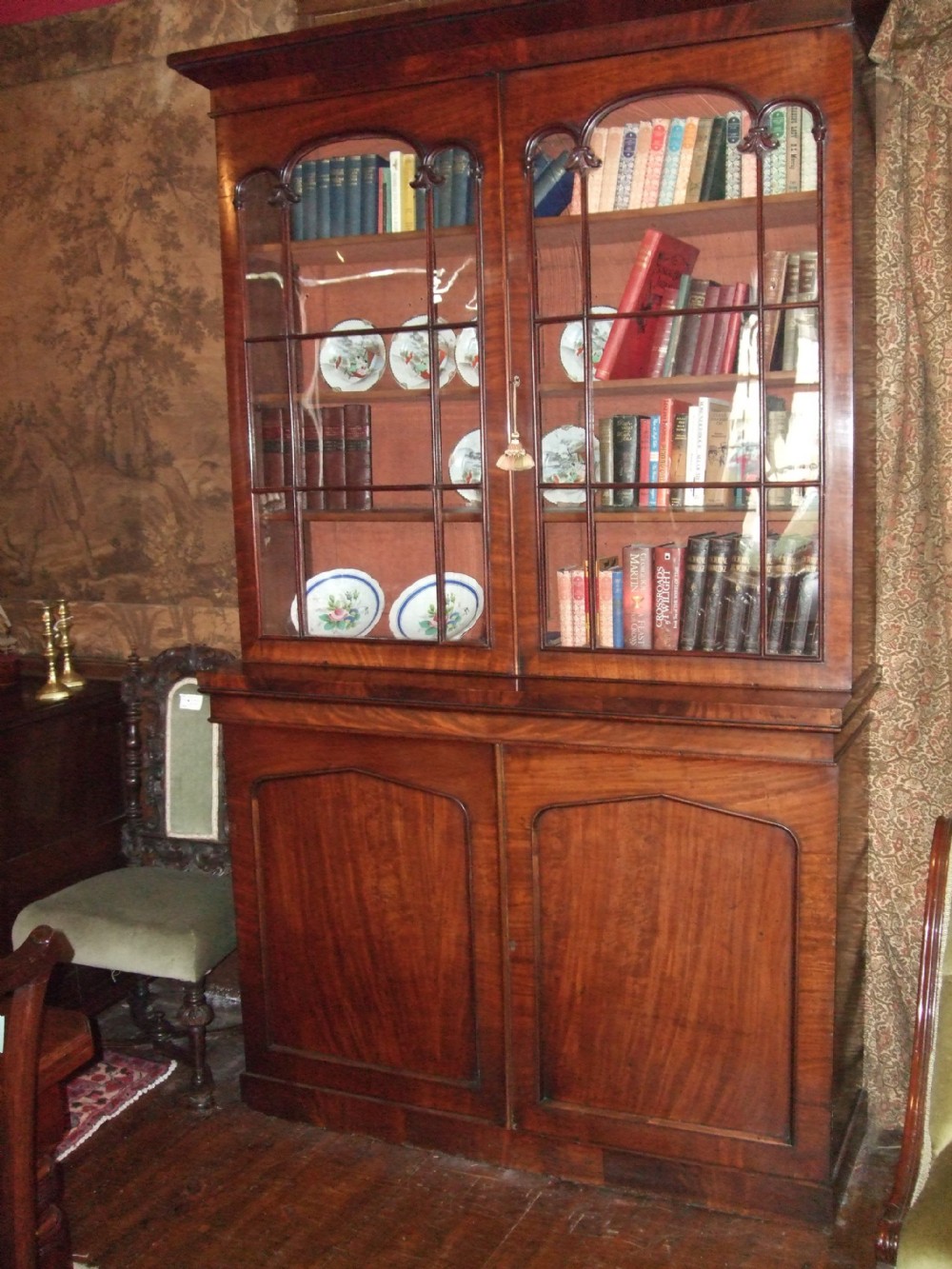 victorian mahogany library glazed bookcase with nicely carved accents