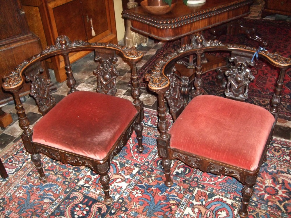 fine pair of 19thc italian carved walnut renaissance style corner chairs