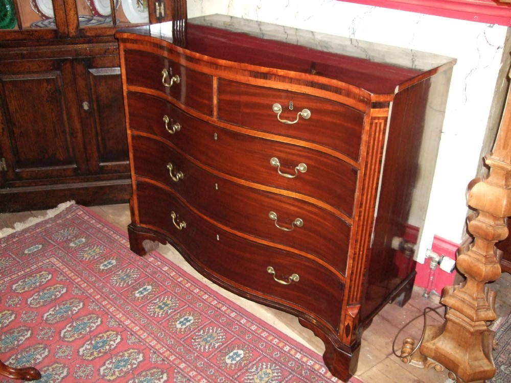 george 3rd mahogany serpentine chest of drawers with satinwood banding inlaid features on bracket feet