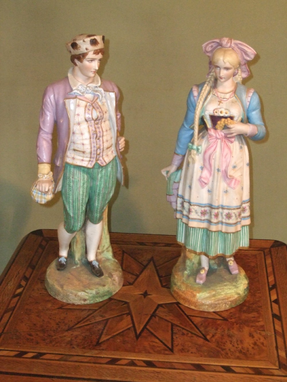 pair of 19thc continental figurineswith impressed lp mark