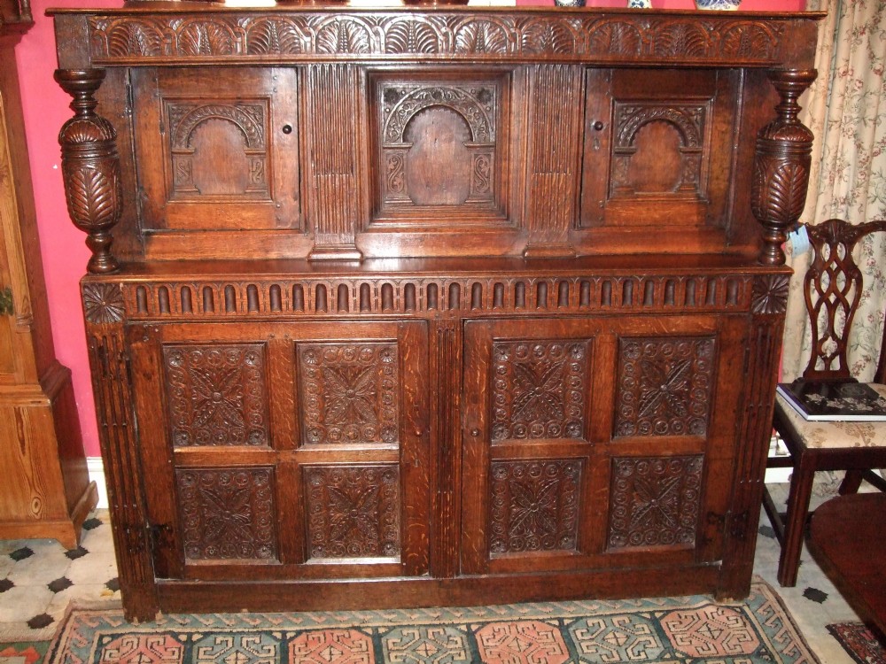 mid 18thc carved oak court cupboard with carved decoration