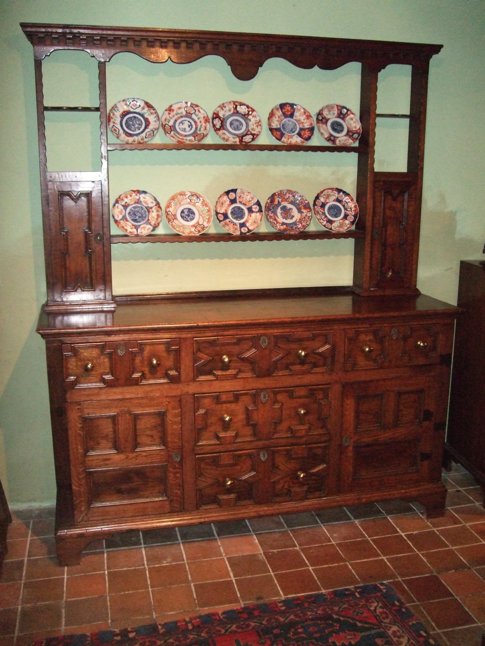 19thc oak geometrically moulded dresser with brass knobs