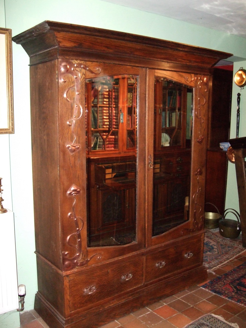 art nouveau oak wardrobe in the manner of liberty c1890