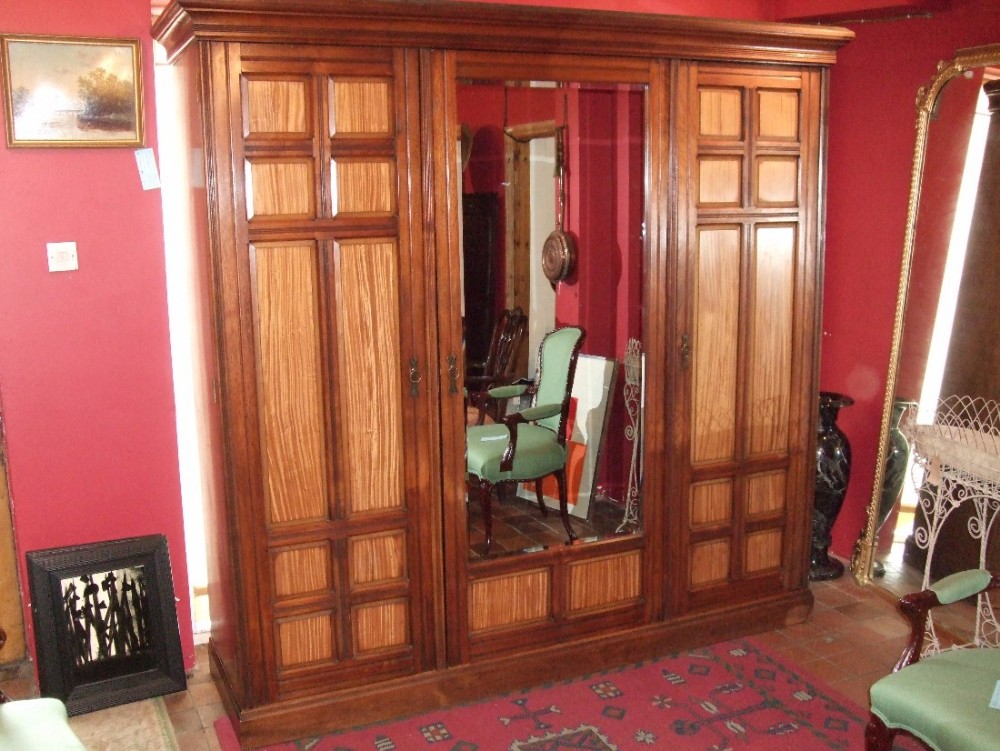 superb gillow stamped victorian arts crafts triple wardrobe mahogany with satinwood panels