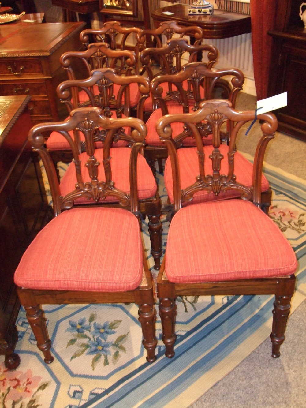fine set of 8 regency rosewood cane seated chairs with squab cushions
