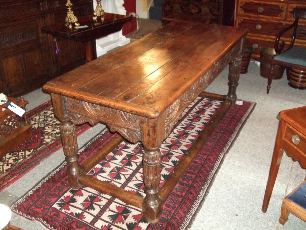 17th oak refrectory table with carved decoration