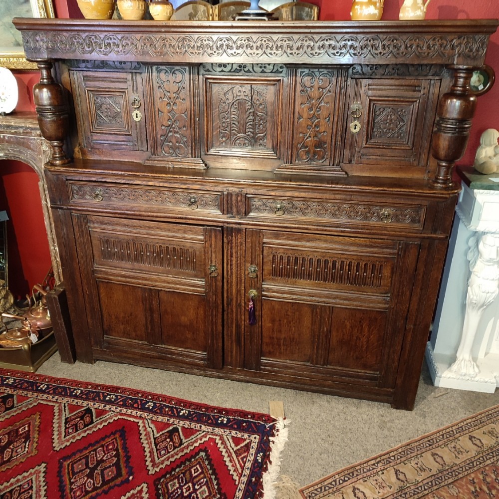 18thc oak court cupboardwith carved decoration