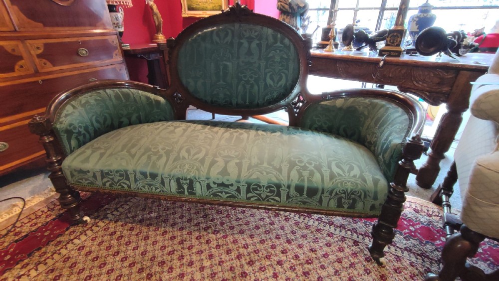 victorian simulated rosewood sofa with carved decoration