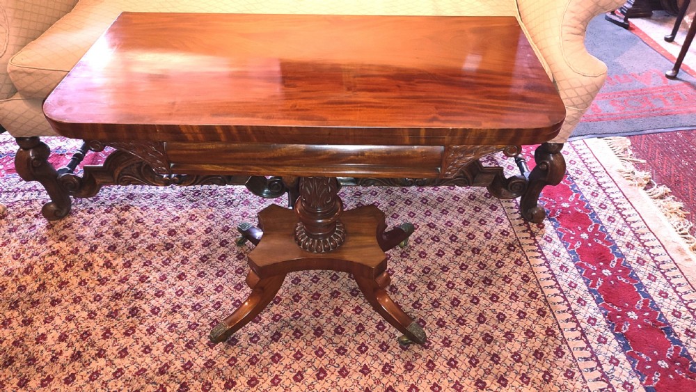 regency period mahogany tea table on pedestal base