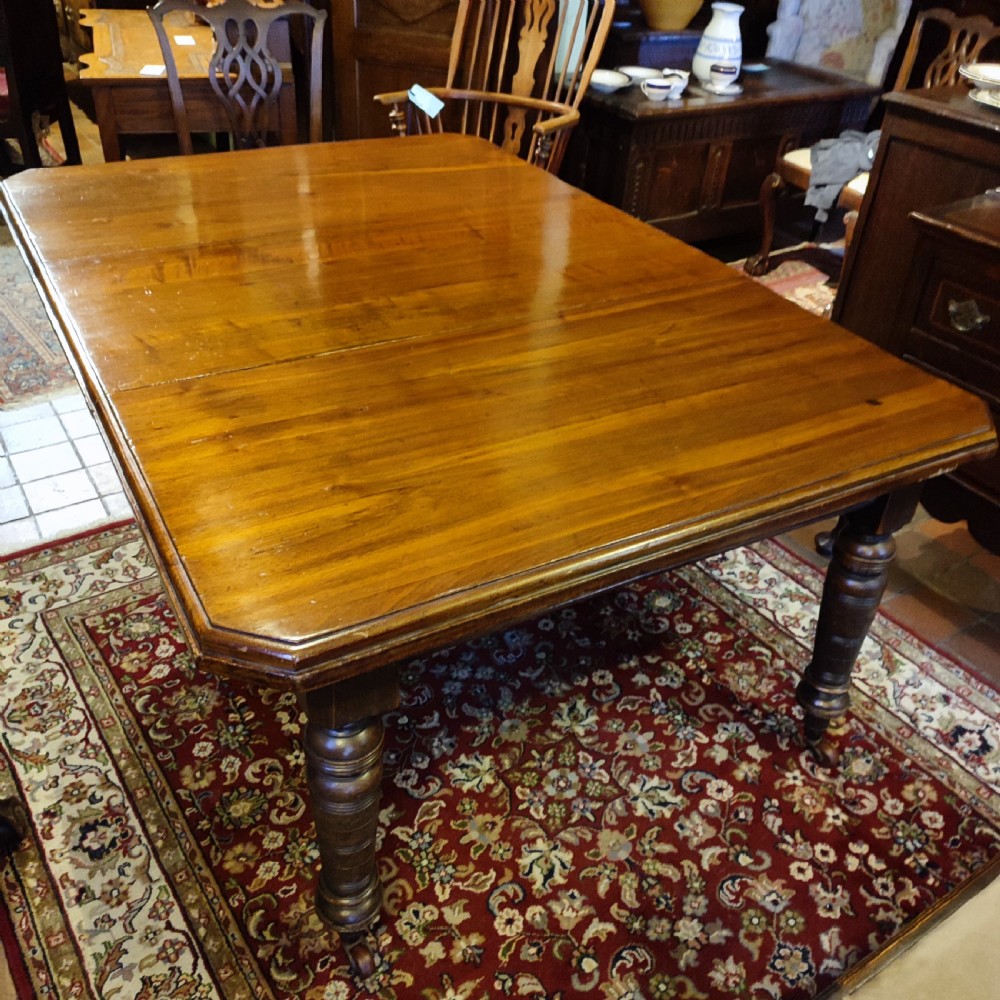 victorian walnut extending dining table with one leaf